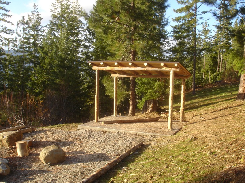 The log woodshed made from Craig Land Timber